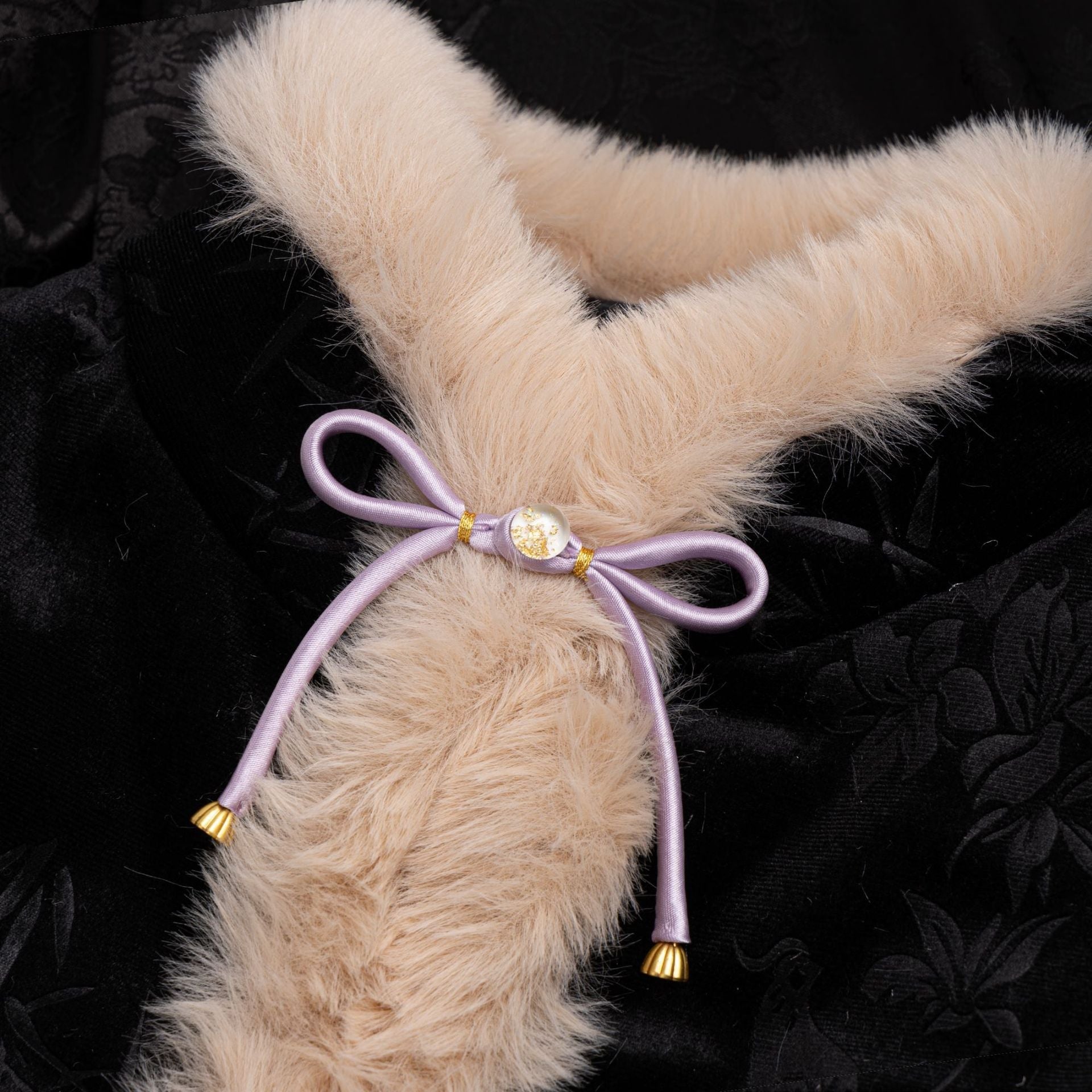 Satin bowknot button with lilac ribbon, gold center and tassel ends