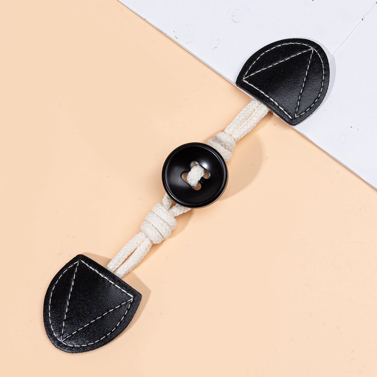 Black 19cm leather sew-on toggles with round resin buttons, 6 pcs