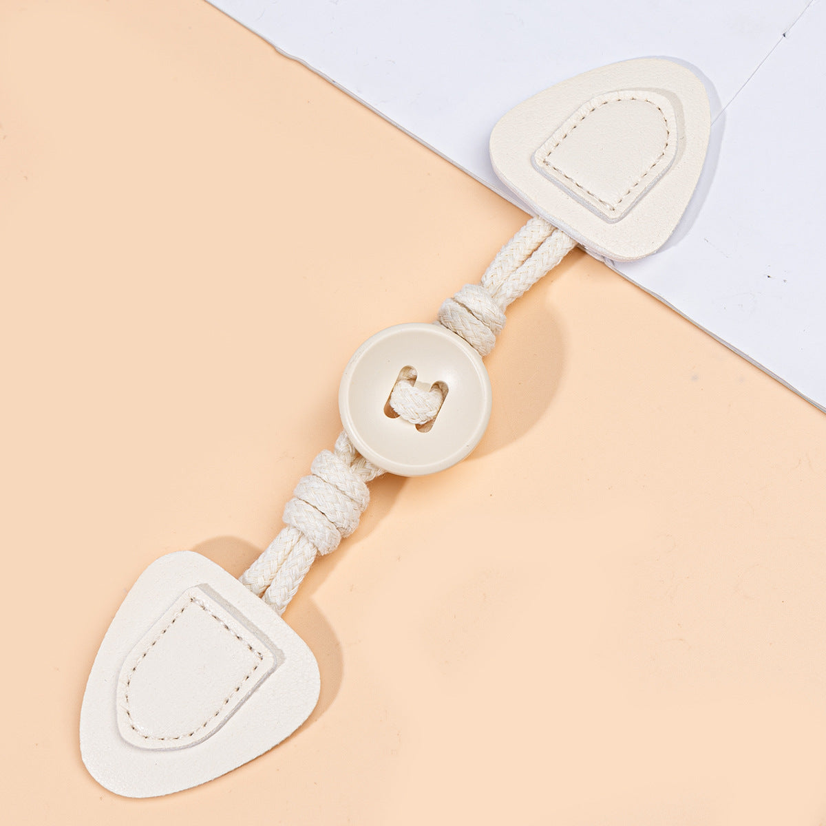 Beige 19cm leather sew-on toggles with round resin buttons, 6 pcs