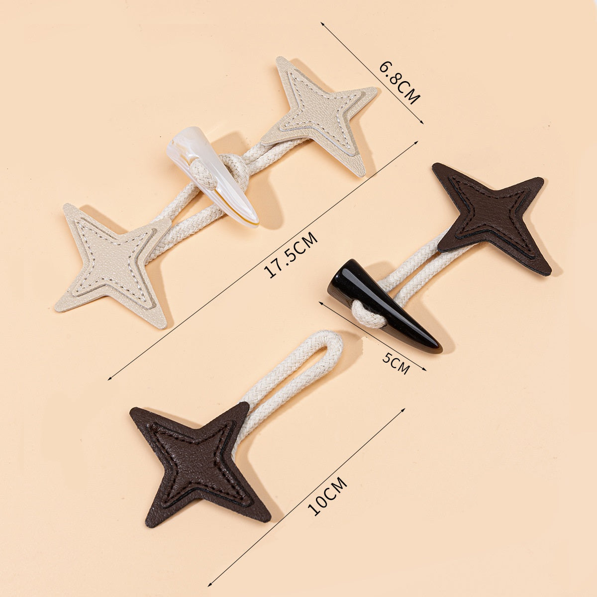 Set Starburst-Leder-Toggles, ca. 17,5 cm, beiger und dunkler Hornknopf