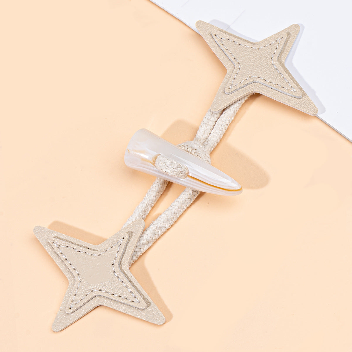 Starburst-Leder-Toggles zum Annähen, hellbeiger Stern mit transparentem Horn-Button