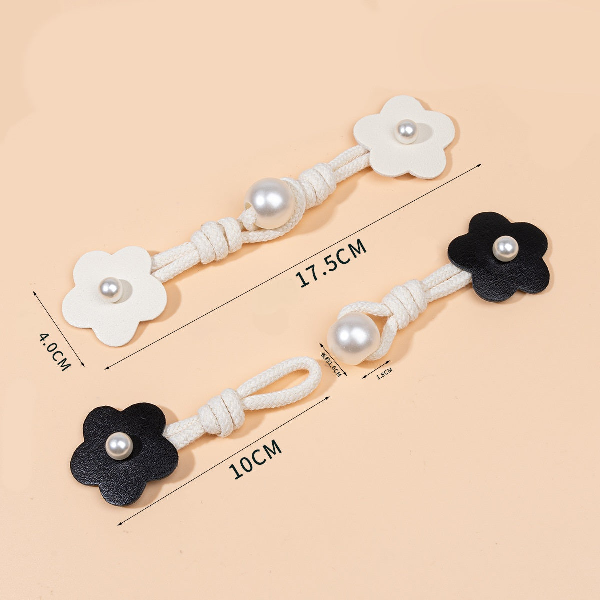 Beige und schwarze Leder-Toggles mit Perlenknopf, Blumenform, ca. 17,5 cm