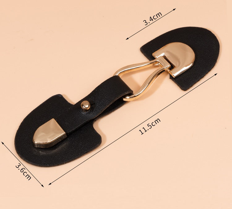 Black leather sew-on toggle with metal buckle, size 11.5 cm shown