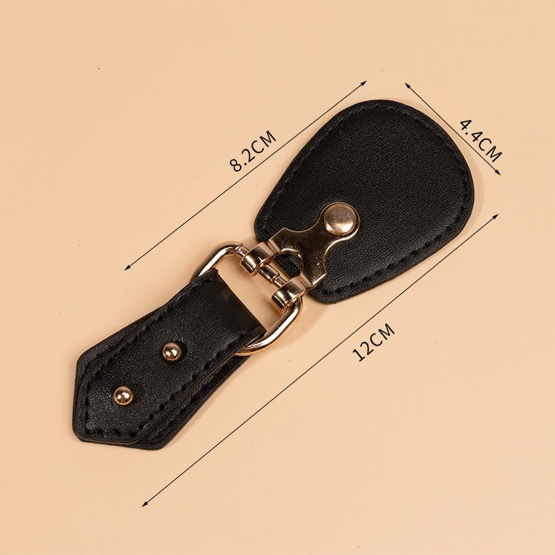 12cm black leather sew-on toggle with silver-tone metal buckle and snap button tabs