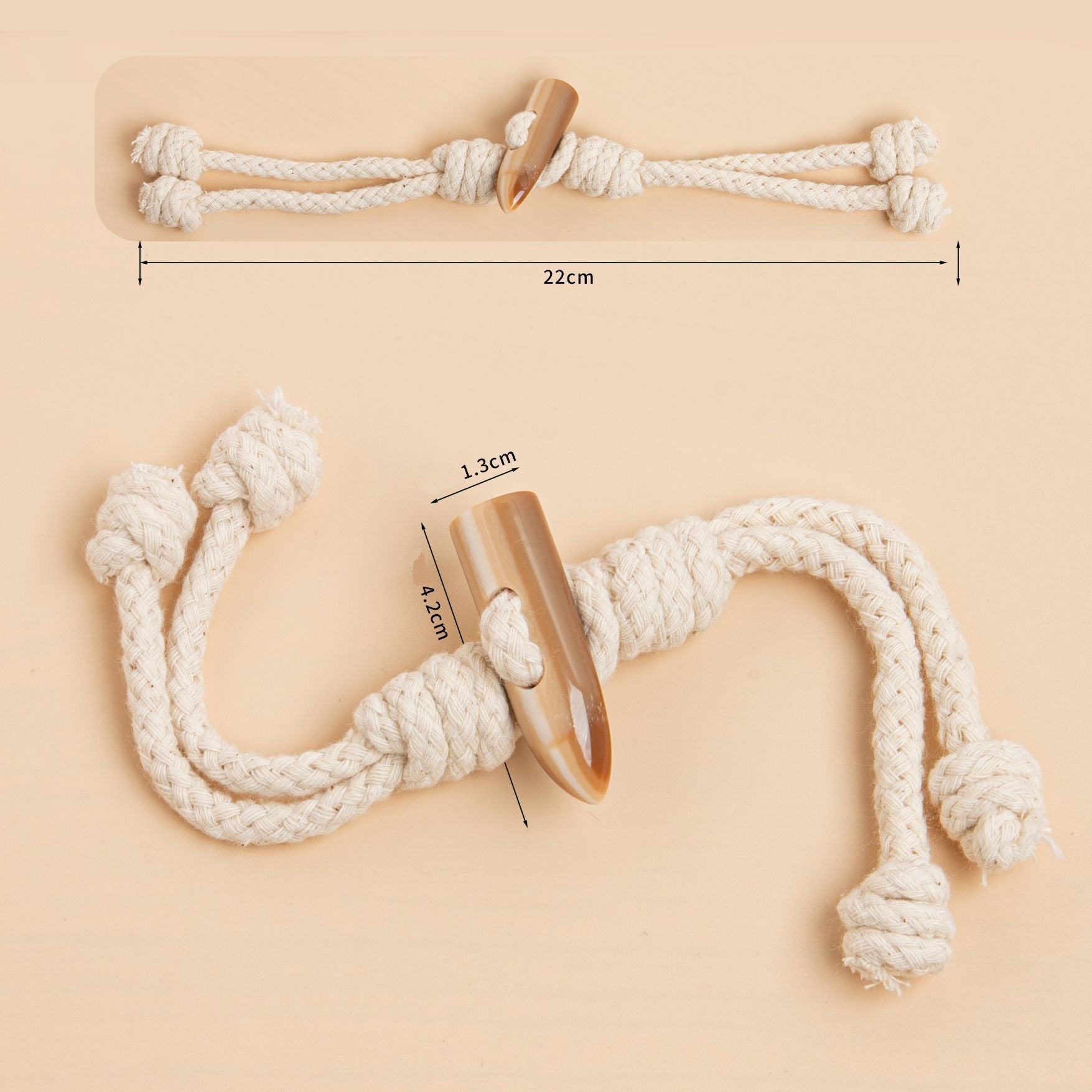 22cm beige rope buckle strap with resin buffalo horn-style tip; size markings visible