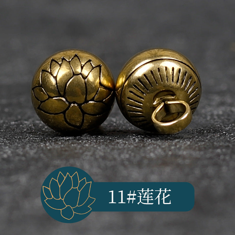 Copper embossed lotus-style button front with looped shank back