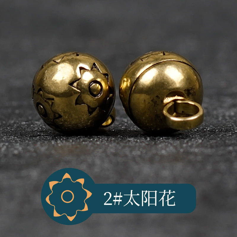 铜色金属纽扣 2#太阳花，正面太阳花刻纹，背面扣眼（包14）