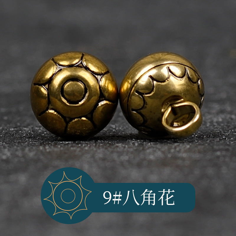 铜色金属纽扣 9#八角花，正面几何花纹，背面扣眼（包14）