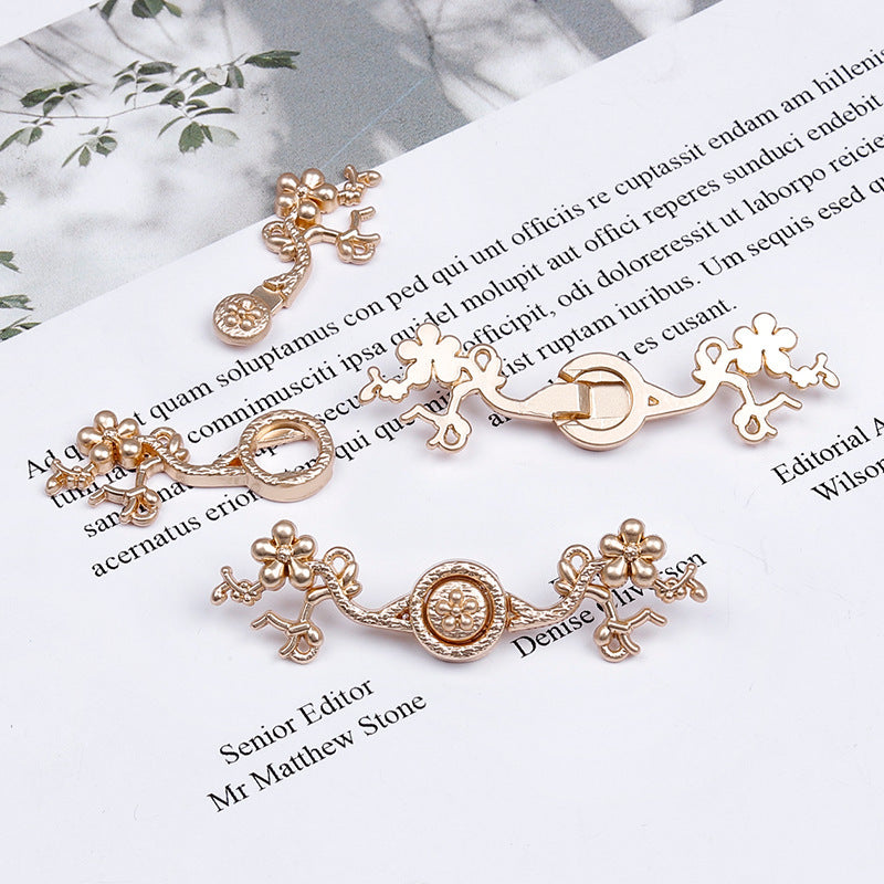 5cm metal frog button, gold-tone with circular plum blossom medallion and dangling loops