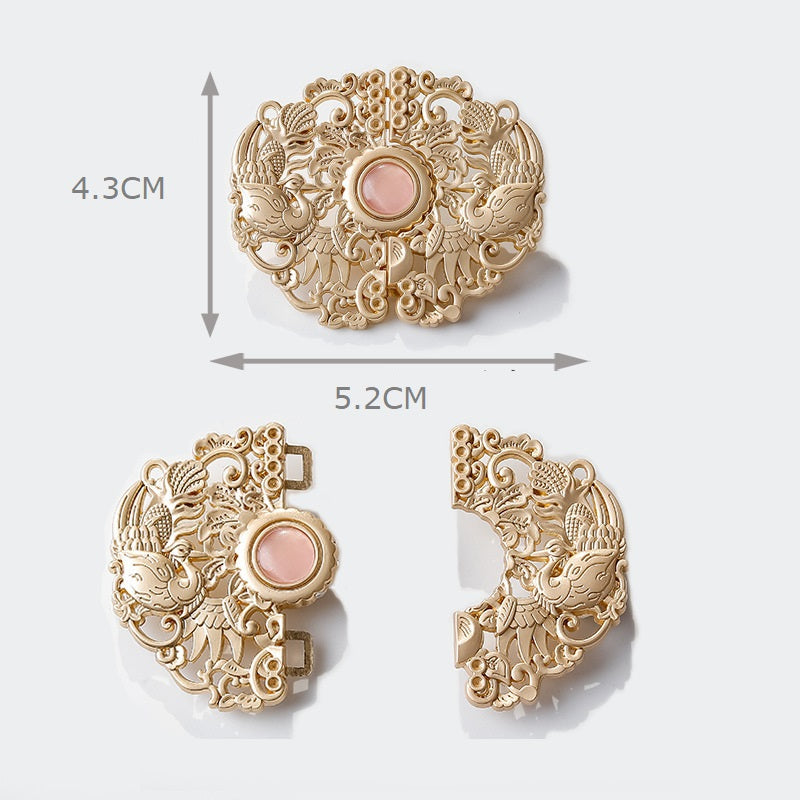 Vintage gold phoenix hook button with pink center cabochon; 5.2cm wide, 4.3cm tall