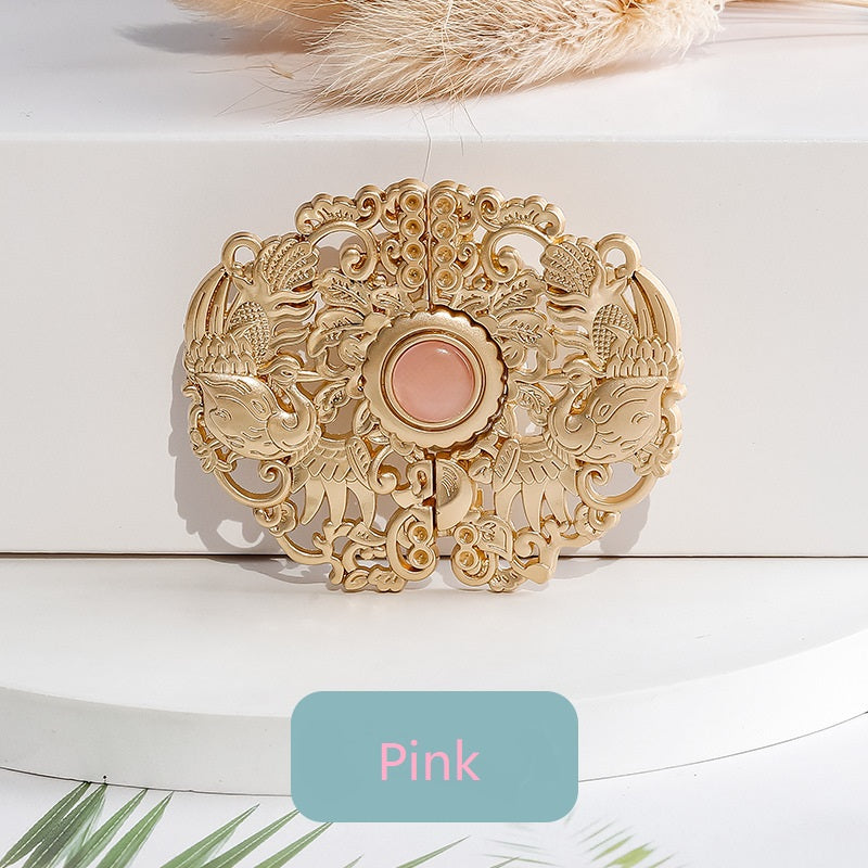 Golden phoenix hook button with pink center cabochon, antique filigree frame