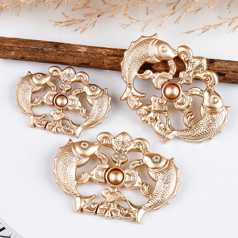 Golden cheongsam frog button design, gold-tone koi motifs with round center knob (3 buttons)