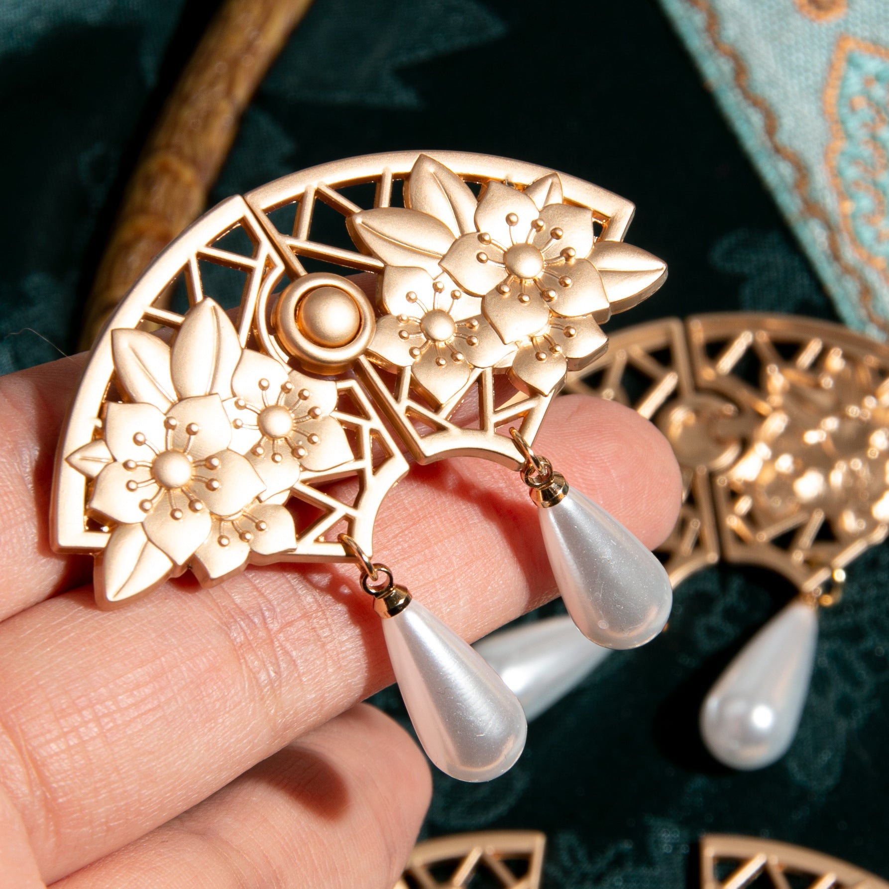 Light Gold Chinese fan frog button, lattice frame, flower clusters, two pear-drop accents