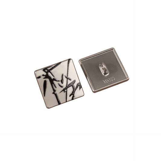 Square button: white front with black ink design, zinc alloy metal back