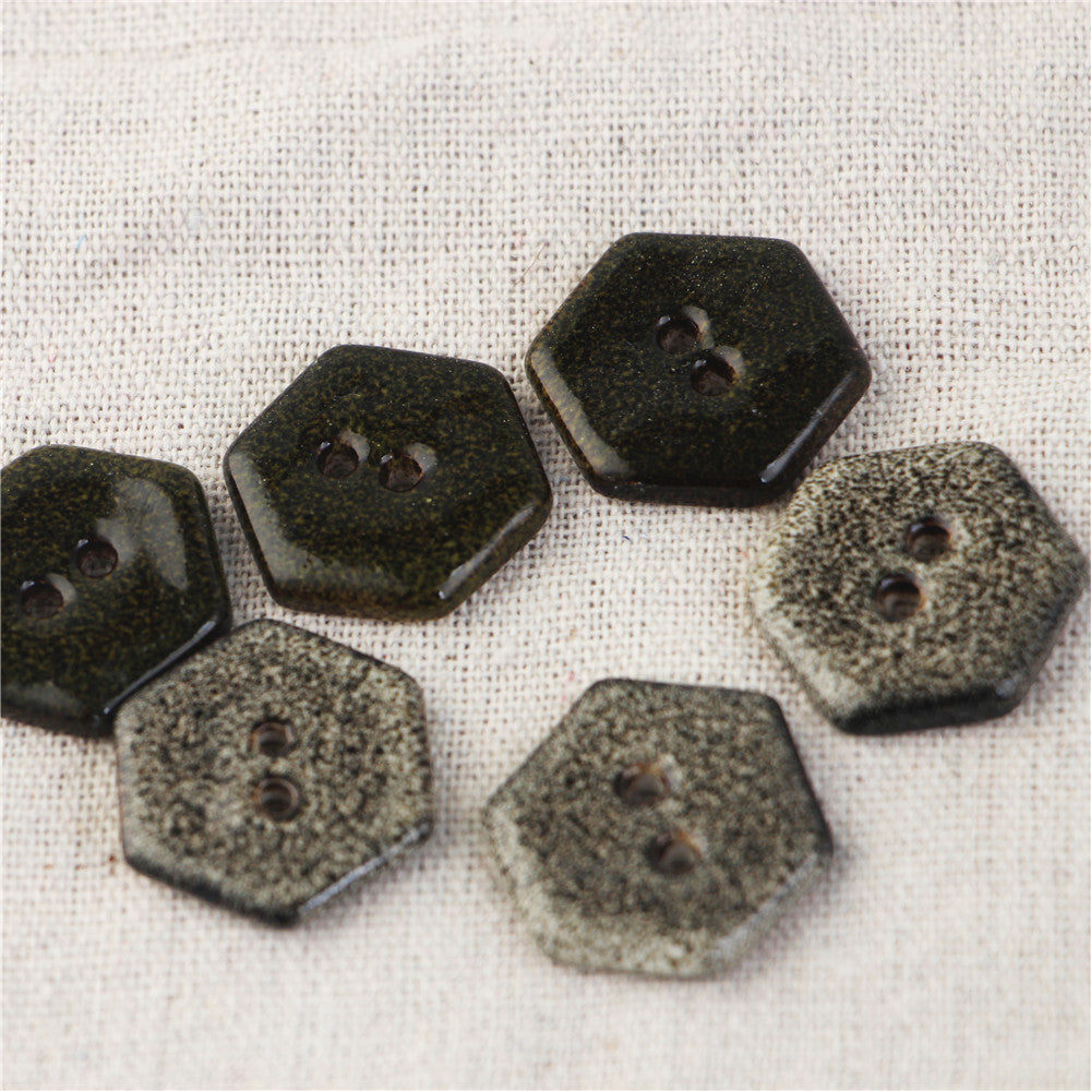 Hexagonal ceramic buttons with 2 holes, dark speckled marble look, 4 pcs