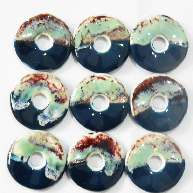 Lotsofbuttons 40mm ceramic pendant buttons, contrasting green top with dark blue base, hole.