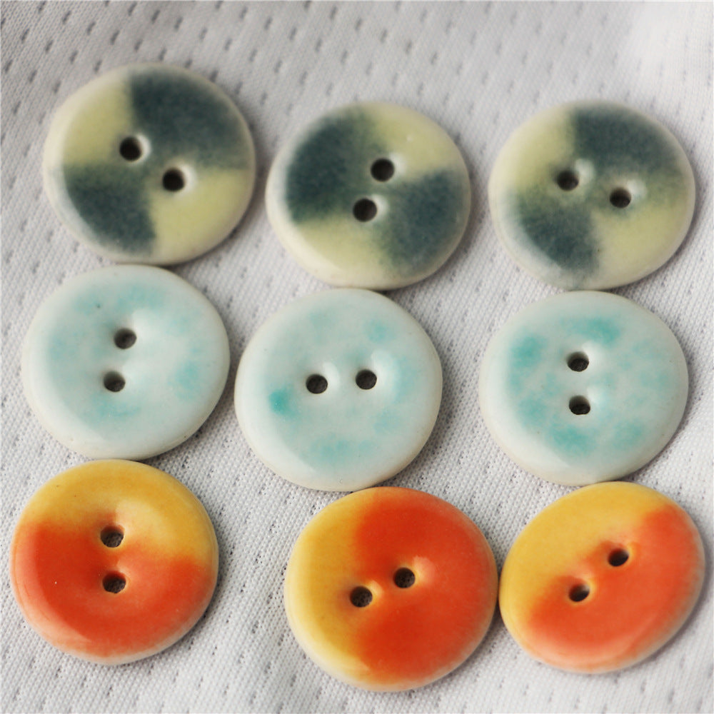 Round 2-hole ceramic buttons: yellow-orange, light blue, green