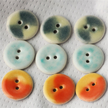 Round 2-hole ceramic buttons: yellow-orange, light blue, green