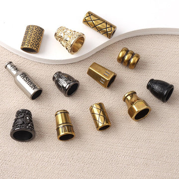 Assorted metal cord end lock stoppers for lanyards, keychain straps, and backpacks