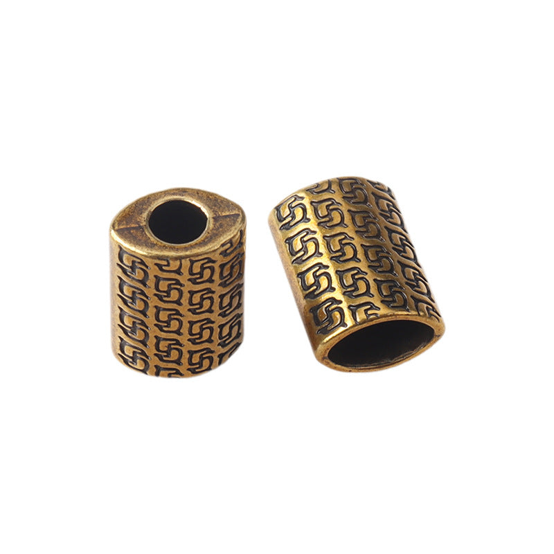 Bronze/gold patterned bell cord end stoppers with black inner openings