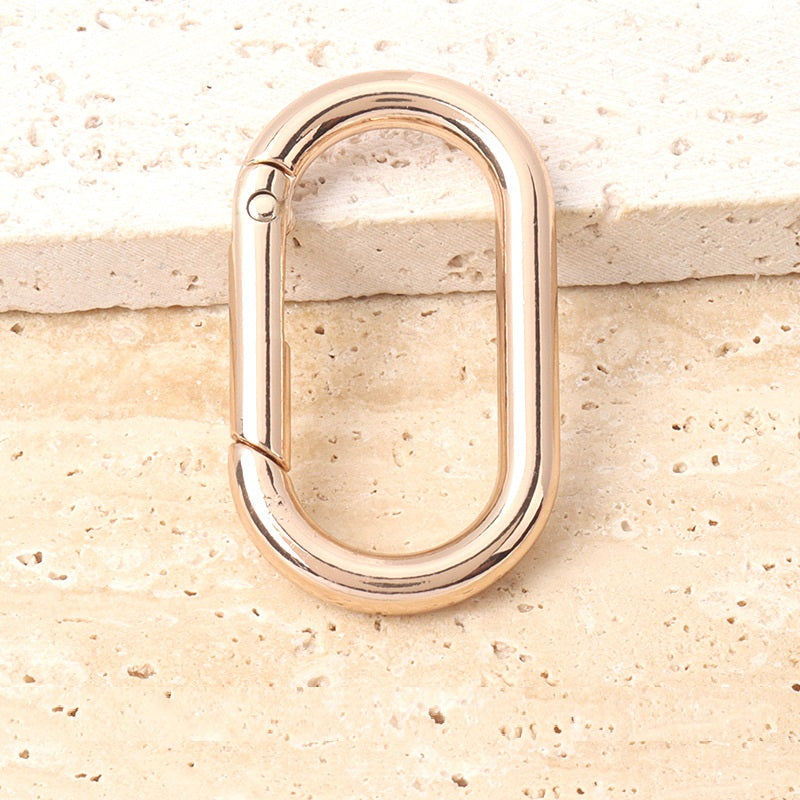 Gold-tone oval hook ring spring buckle, metal spring-clip closure ring