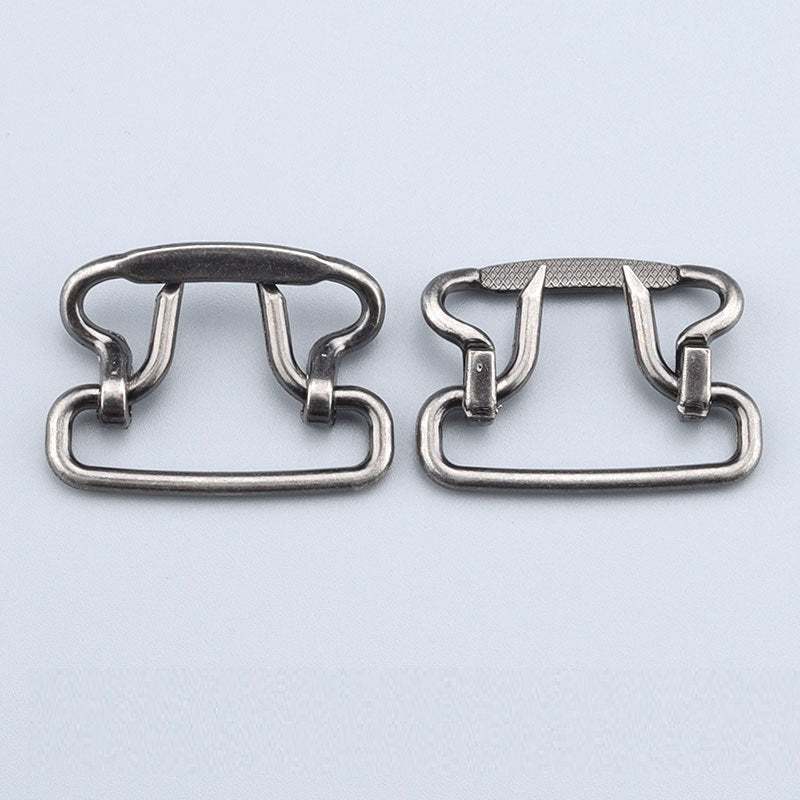 Two 28mm plated buckle clasps, silver tone; one with textured top bar