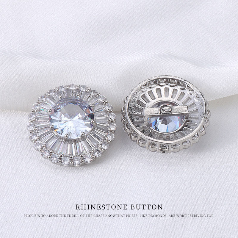 Close-up rhinestone button: round crystal front and metal shank back, silver tone