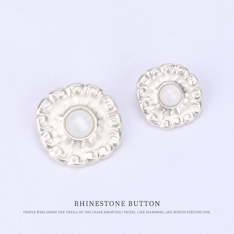 Two matt silver metal pearl shank buttons with white center and scalloped border