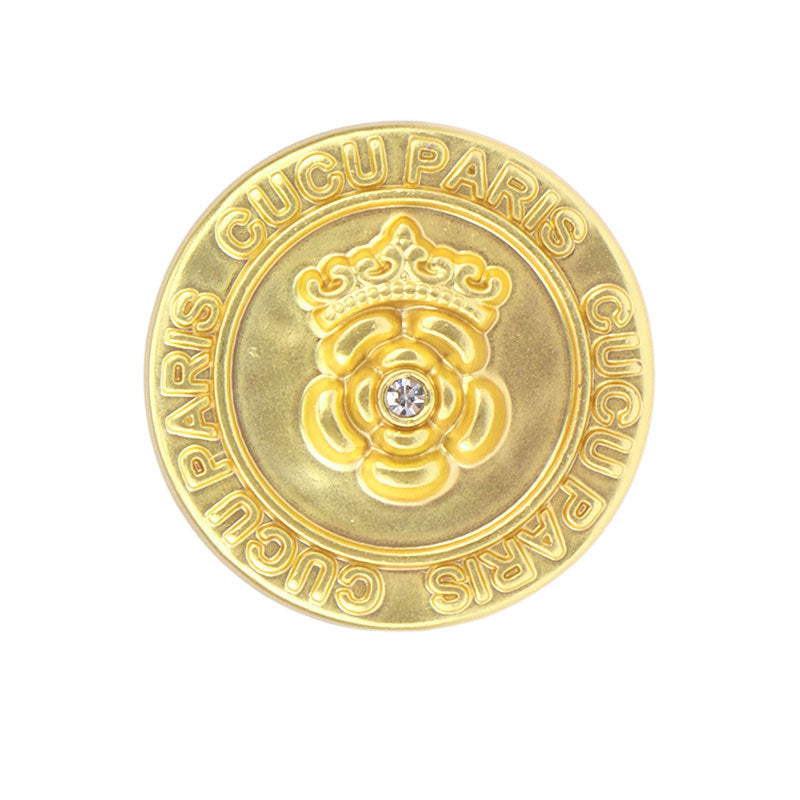 Round frosted gold metal shank button with central rhinestone flower crest