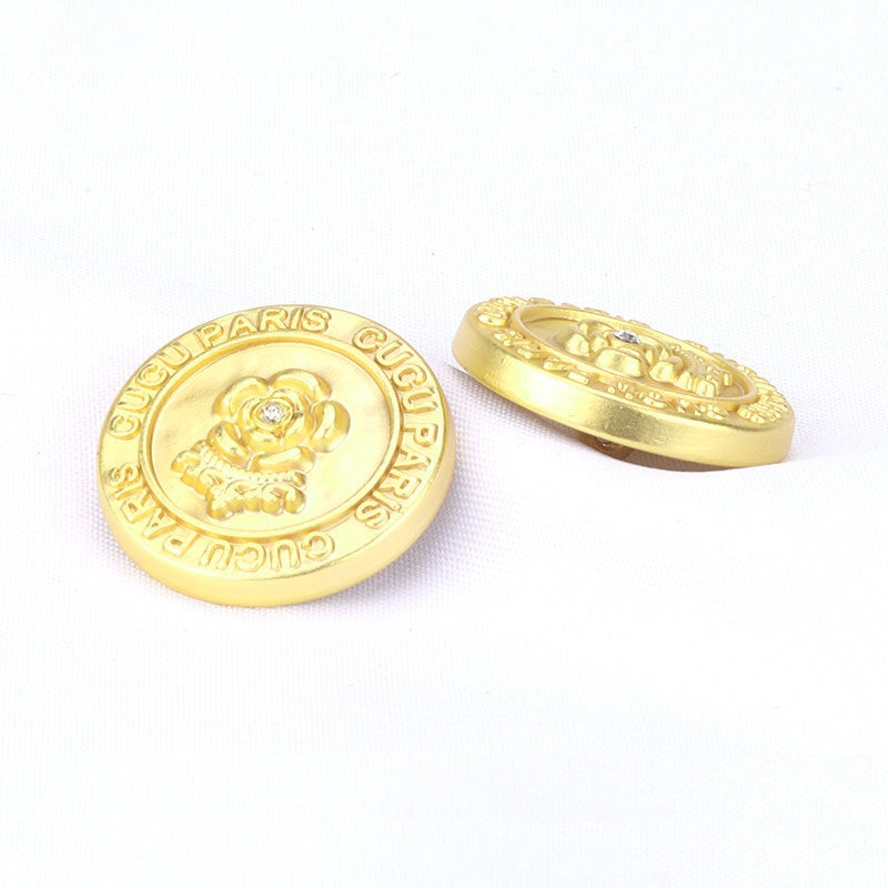 Gold metal shank button front with rhinestone crest and matching side view