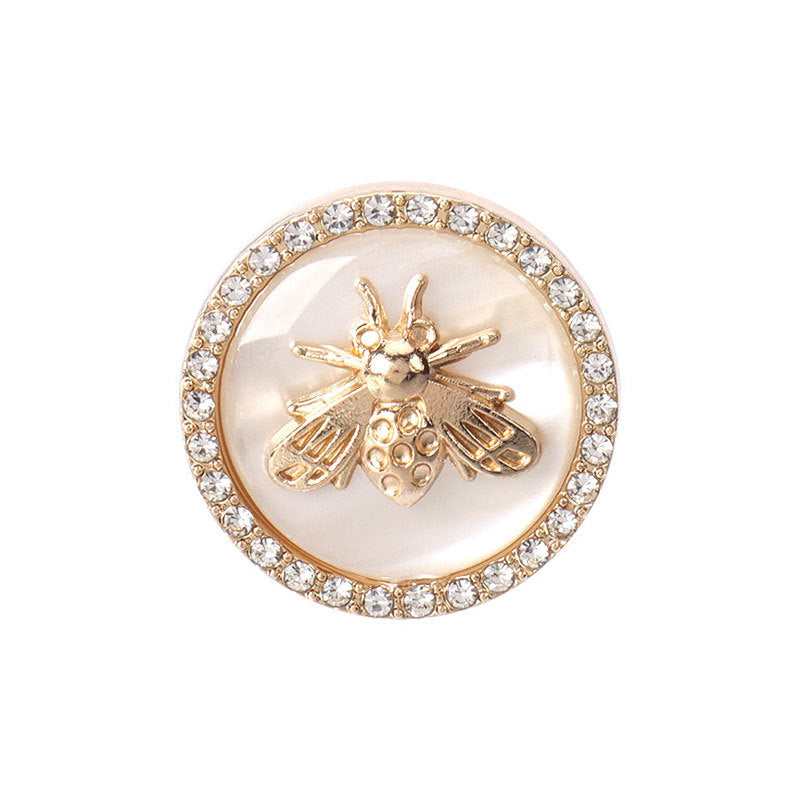 Round bee-shaped rhinestone button with gold-tone wings and clear crystal border