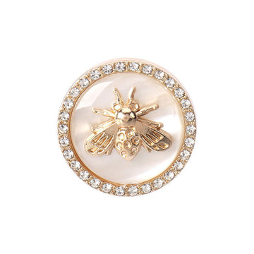 Round bee-shaped rhinestone button with gold-tone wings and clear crystal border