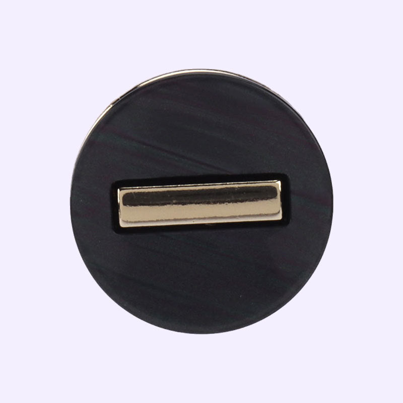 Round resin shank button, black/dark with dark center stripe and gold-tone frame