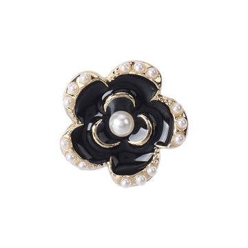 Black enamel floral coat button with gold edging and pearl-like studs, 18–23 mm