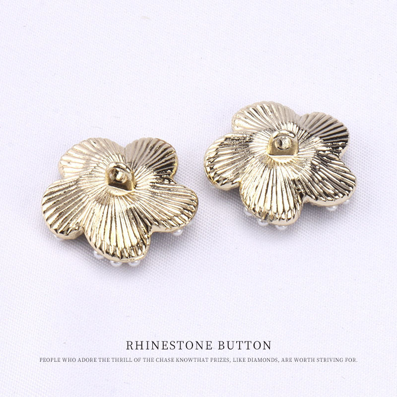 Gold-tone scalloped flower buttons with small rhinestone center, pair view