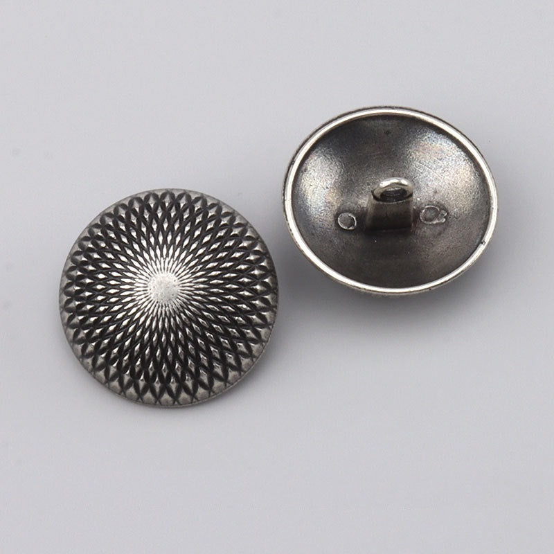 Dark silver metal button with sunburst texture front and visible underside shank