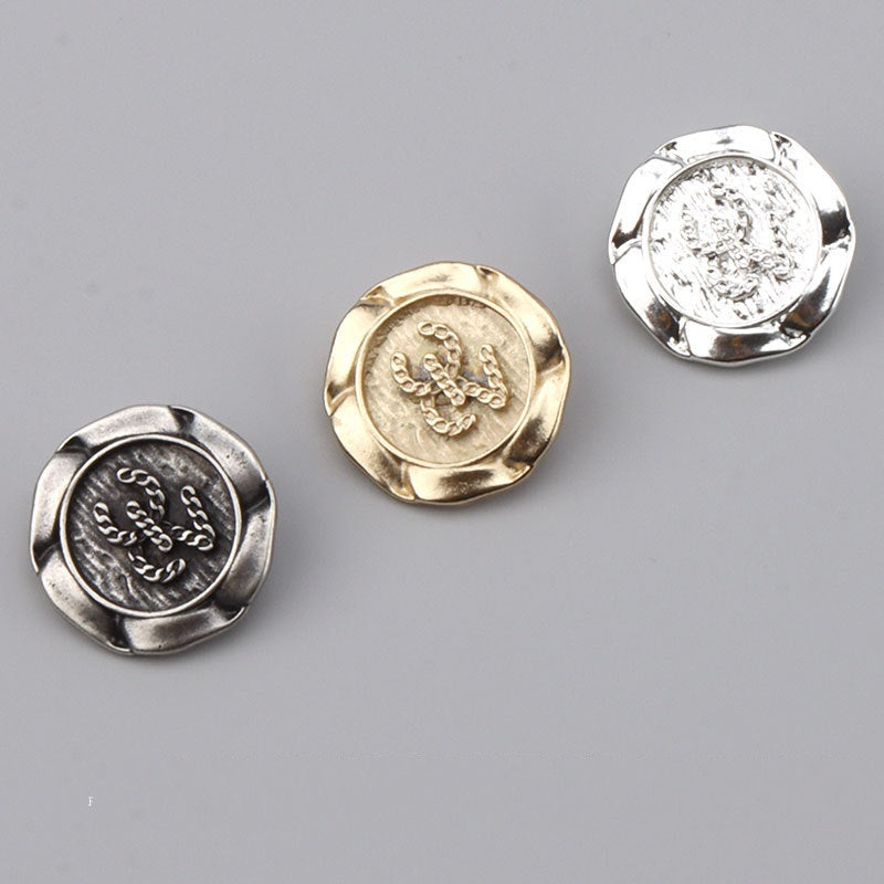 Set of 3 metal buttons: gold and silver tones, decorative engraved fronts