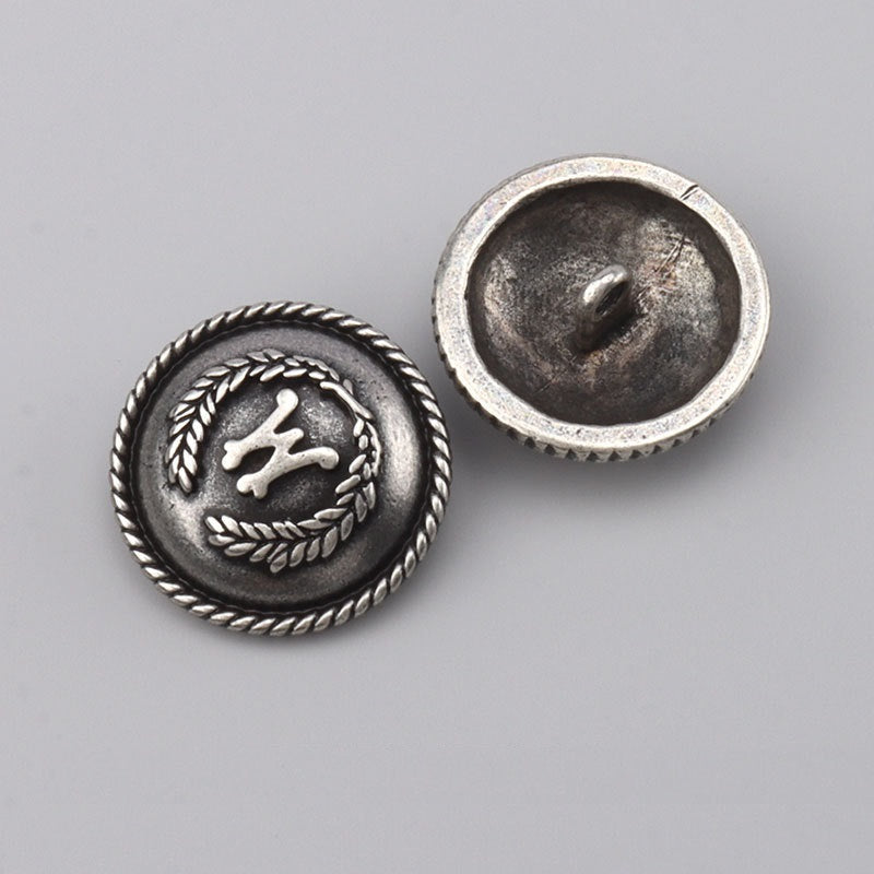 Dark silver metal button front with wreath and matching back with shank