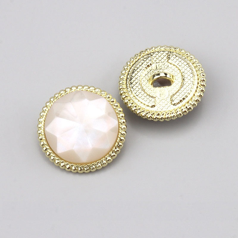 Beige round resin button with gold diamond-cut border and alloy shank; front/back