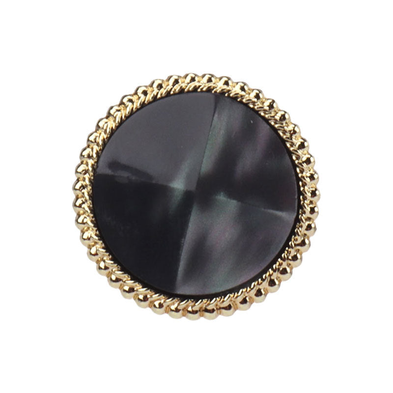 Black faceted resin button with gold-tone rim and metal shank