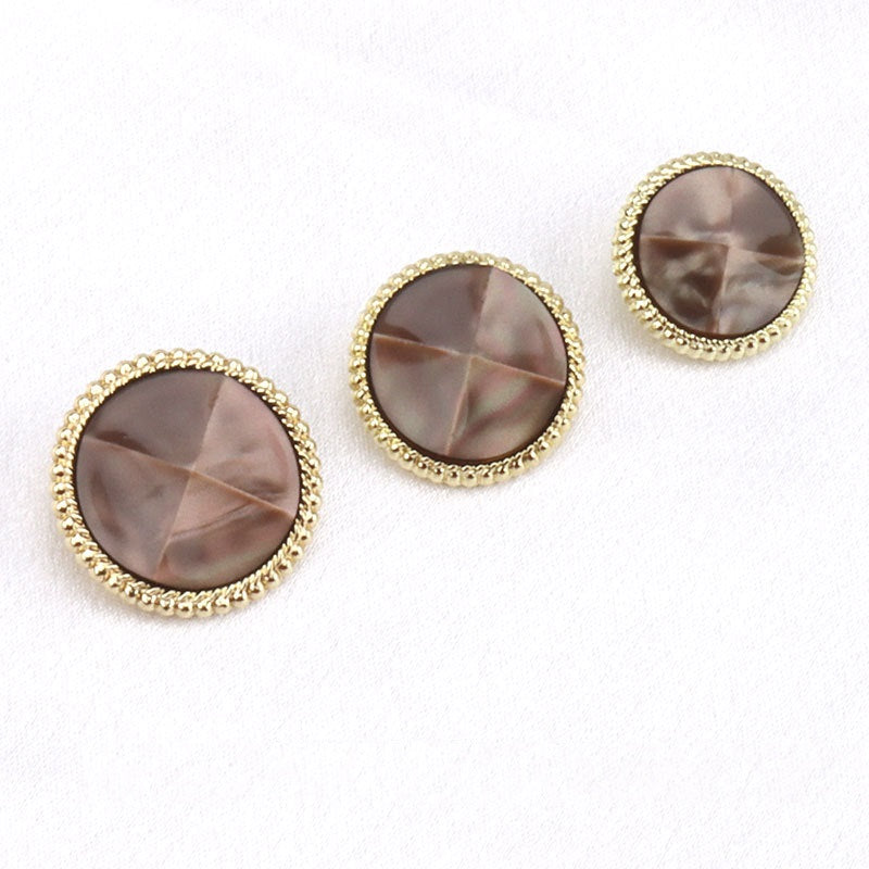 Brown-toned faceted resin buttons with gold-tone beaded rim