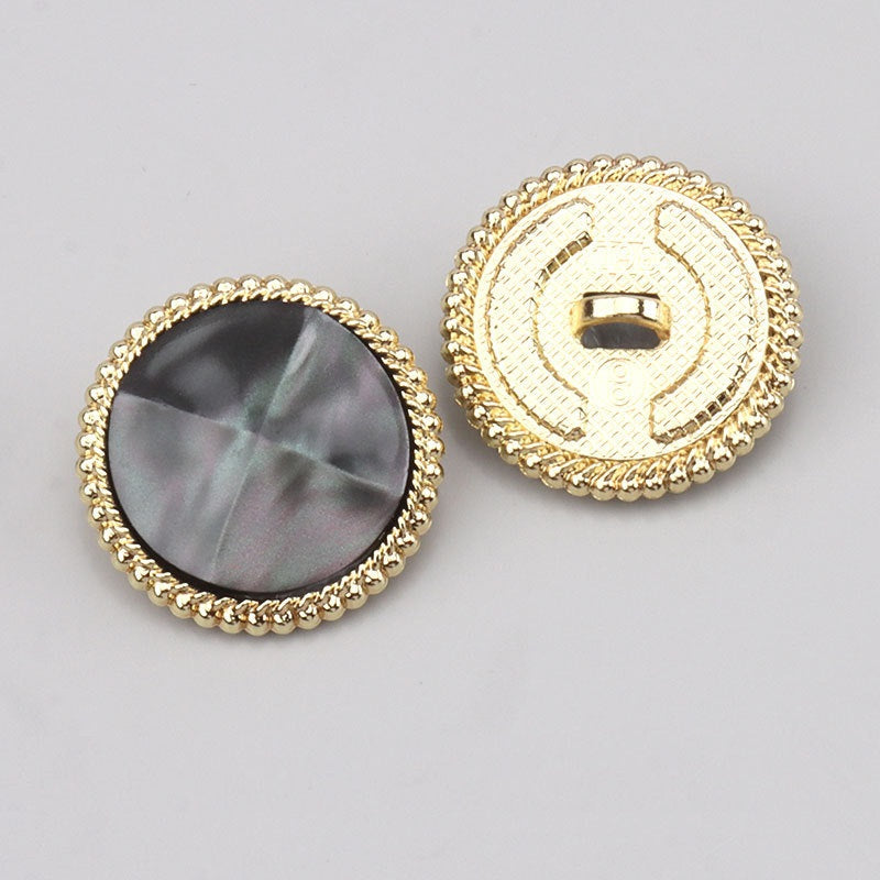 Black faceted resin button front and back view with gold-tone beaded edge, metal shank