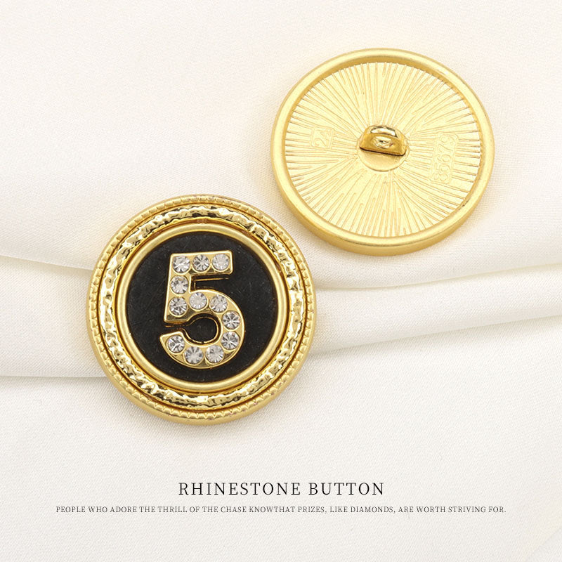 Round gold rhinestone button, number 5 design on black center, shank back