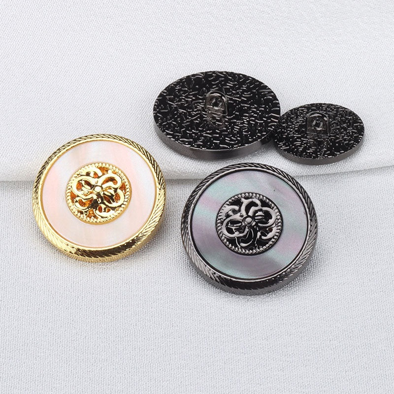 Mixed gold and gunmetal resin metal buttons with floral crest and textured edges, 4 shown