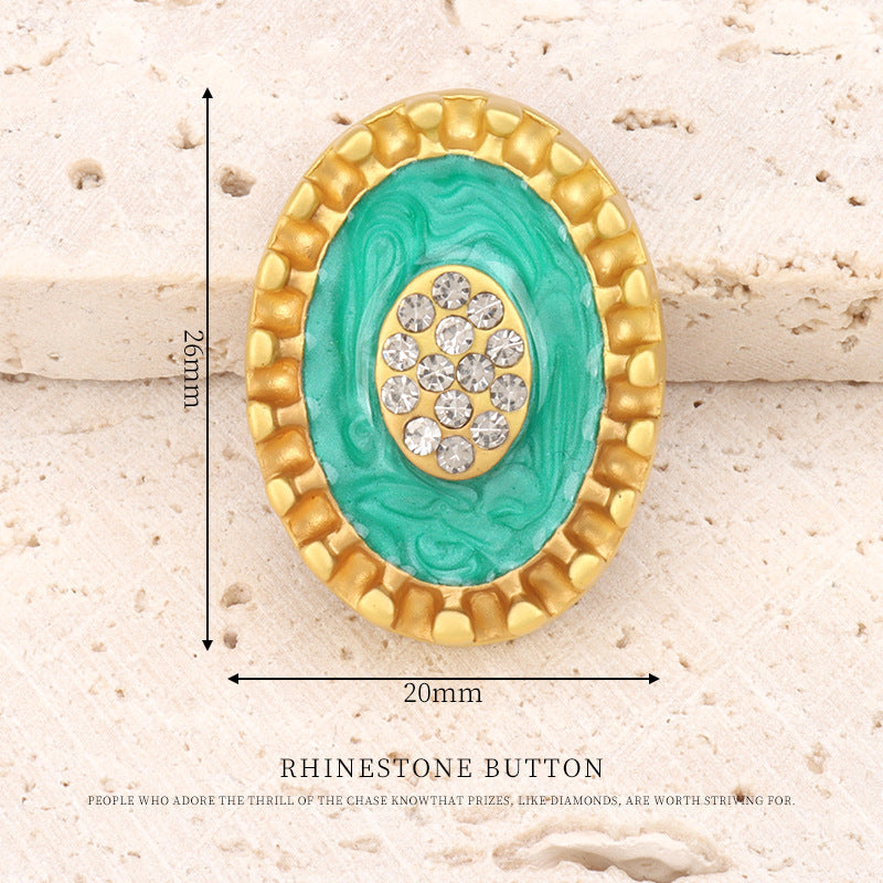 Oval rhinestone metal button, matte gold, teal center, 20mm wide, 26mm tall