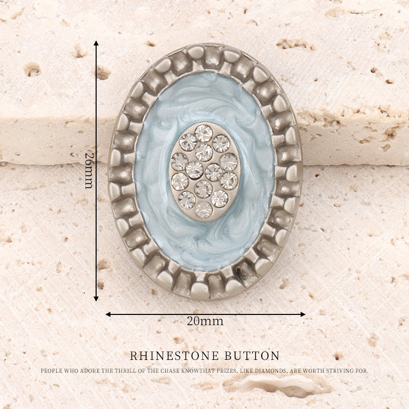 Oval rhinestone metal button, matte silver, light blue center, 20mm wide, 26mm tall