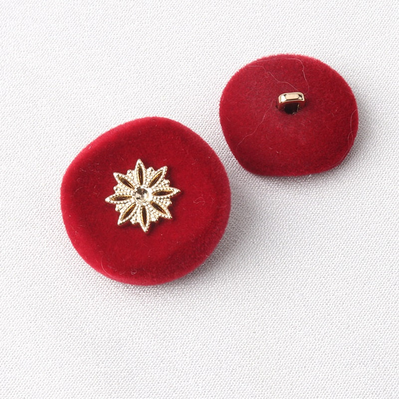 Red flocked coat buttons with silver snowflake front and metal shank detail