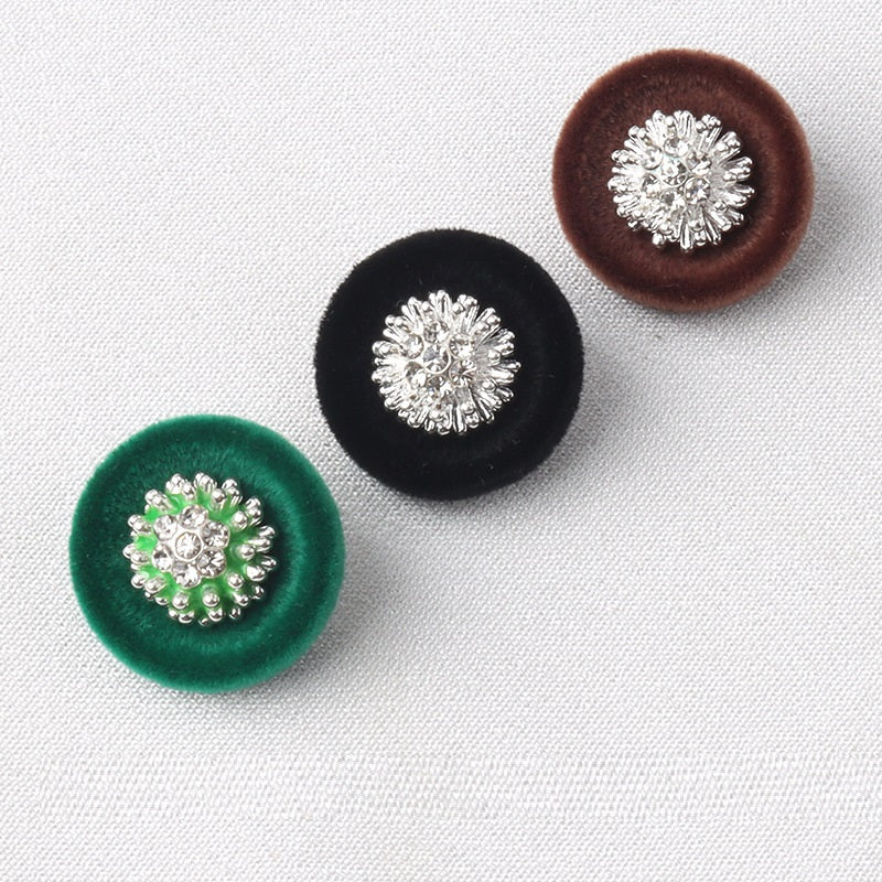 Flocked diamond shank buttons showing black, brown, and green with silver rhinestone clusters