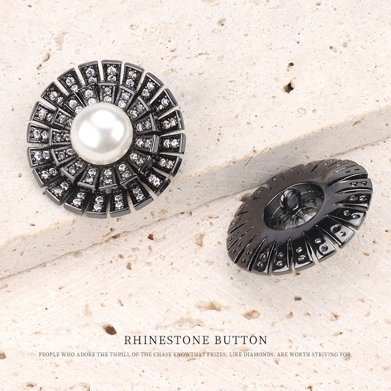 Gunmetal pearl rhinestone coat button front with visible back shank and setting.