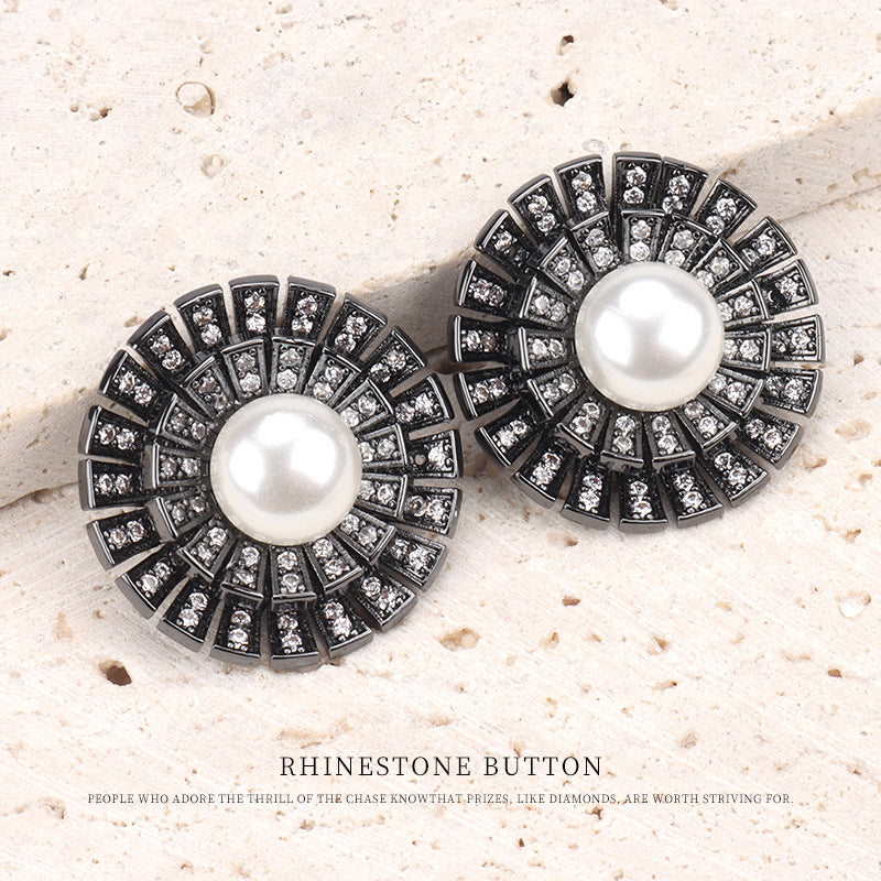 Pair of gunmetal rhinestone buttons with white pearl center, round 1-inch style.